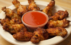 Brand New - Smokin Dry Rub Wings - We've worked to improve our cooking process, creating a better texture, PLUS we're adding this all new flavor featuring an herby dry rub seasoning, delicious all on its own or dipped in your choice of sauce (ranch, bleu cheese, honey mustard, or creamy sriracha) - Look for free samples at Craft Beer Month Events!